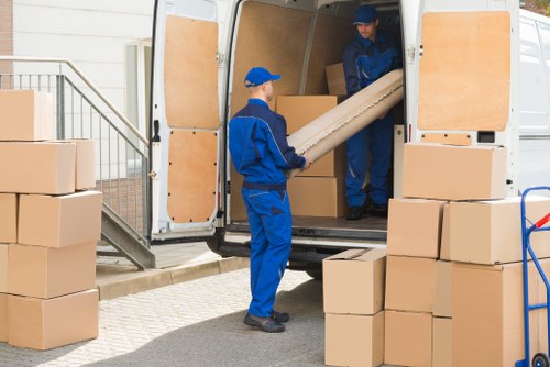 Student removals team helping with boxes in a Richmond residential street