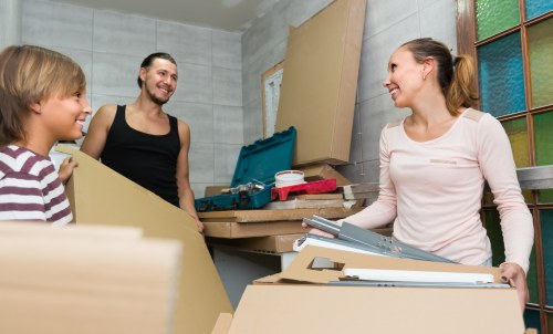 Removal team planning a Richmond home move near a residential street