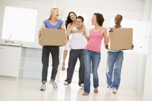 Removal van and moving team in a Richmond residential street