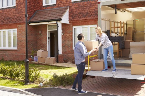 Office removals planning in Richmond with moving boxes and workspace setup