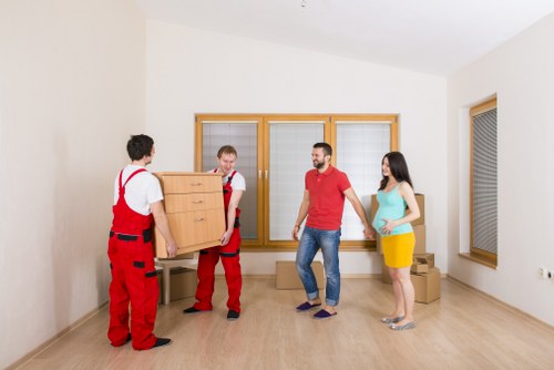 Commercial movers transporting office furniture in Richmond