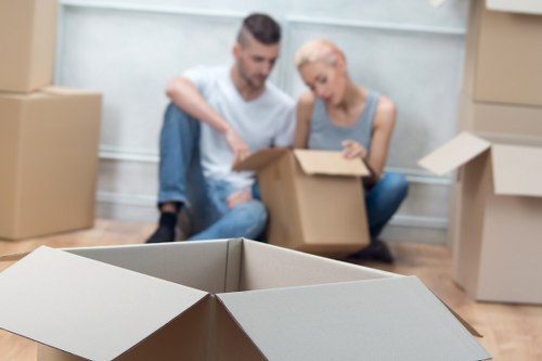 Professional movers unloading furniture at a Richmond property