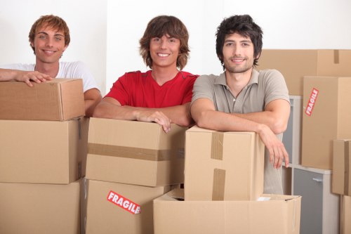 Professional movers loading furniture for an urgent Richmond move